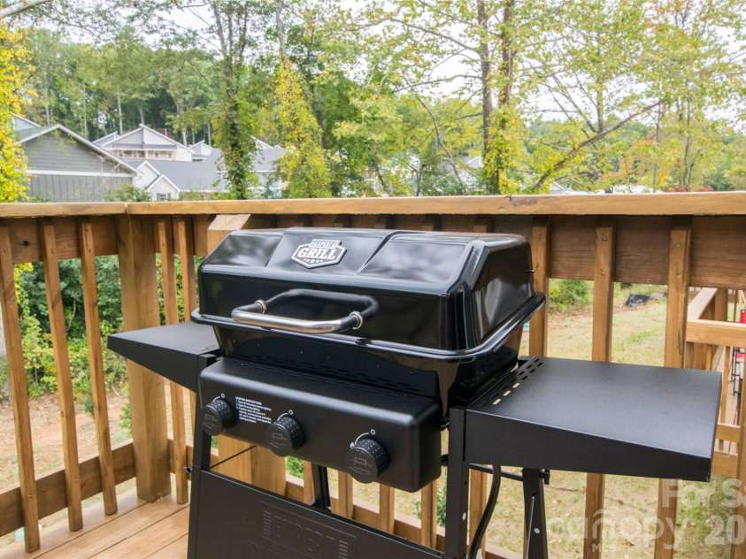 309 Jenna Clare Lane, Asheville, NC 28803.  MLS# CAR4428710, YatesRealty ID 55229. Private back deck for grilling