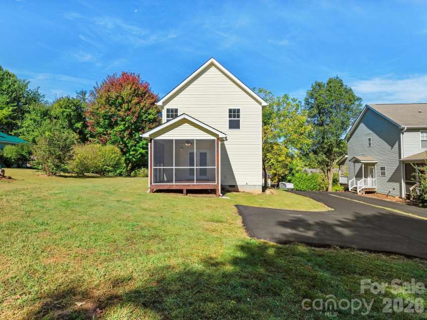 81 Crayton Road, Asheville, NC 28803.  MLS# CAR4432139, YatesRealty ID 55230. Backyard view.