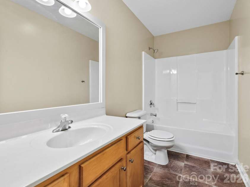 81 Crayton Road, Asheville, NC 28803.  MLS# CAR4432139, YatesRealty ID 55230. Guest bathroom