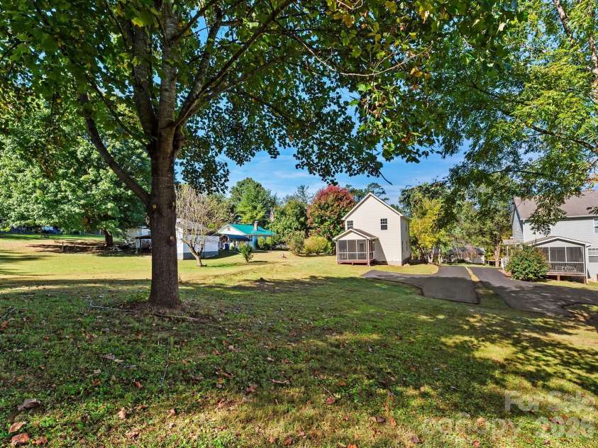 81 Crayton Road, Asheville, NC 28803.  MLS# CAR4432139, YatesRealty ID 55230. Large flat backyard
