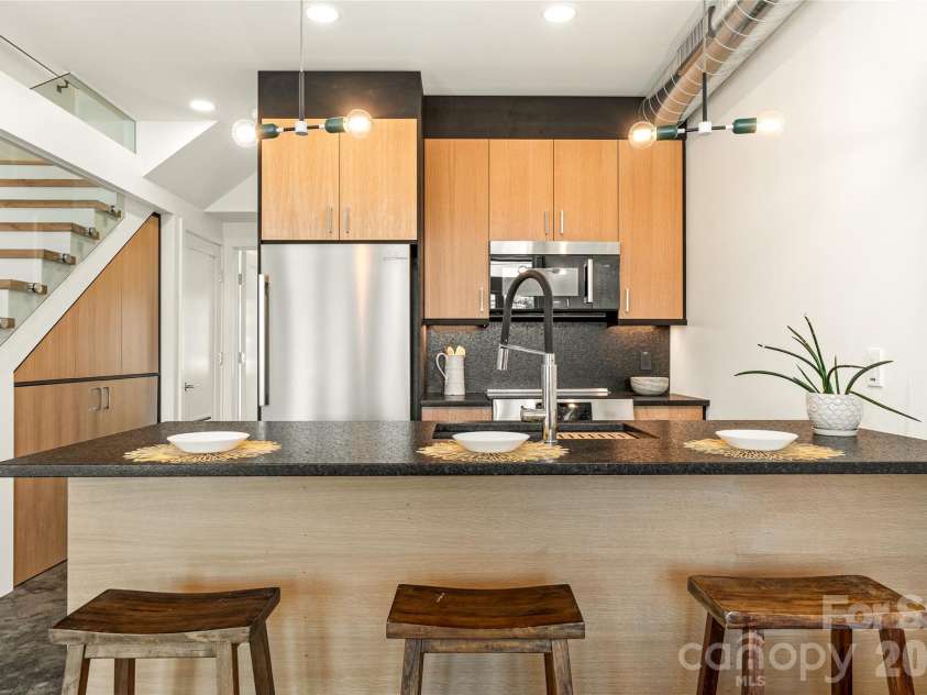 6 Roberts Street, Asheville, NC 28801.  MLS# CAR4431489, YatesRealty ID 55241. Custom kitchen with Bosch appliance package.