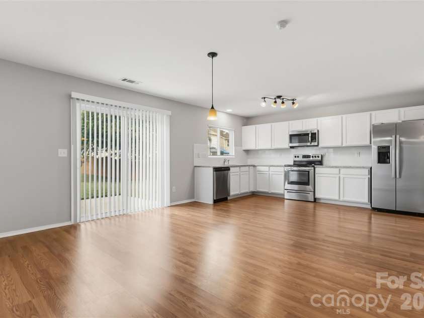 6215 Woodland Commons Drive, Charlotte, NC 28269.  MLS# CAR4432348, YatesRealty ID 55242. 