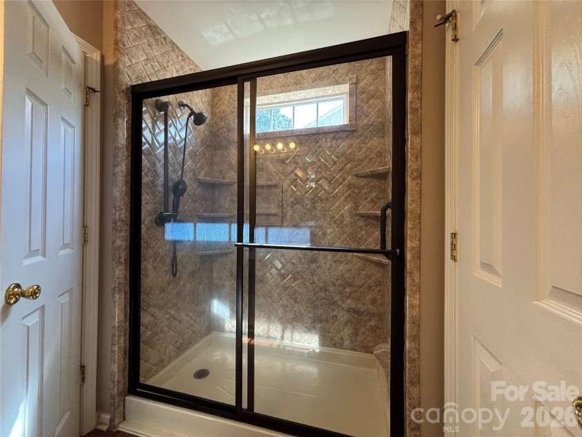 1619 Eagle Lake Drive, Indian Land, SC 29707.  MLS# CAR4431314, YatesRealty ID 55250. Primary bath shower