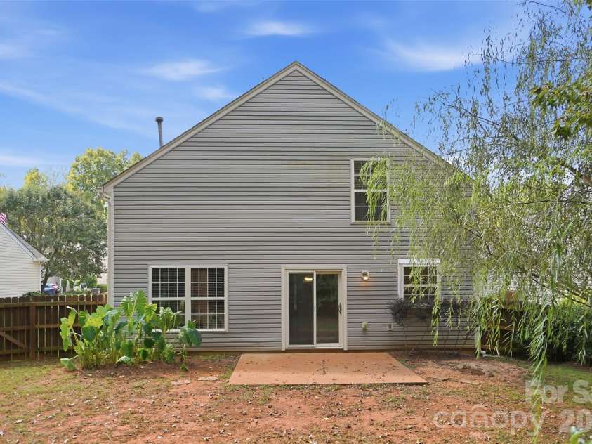 1619 Eagle Lake Drive, Indian Land, SC 29707.  MLS# CAR4431314, YatesRealty ID 55250. Rear exterior and patio