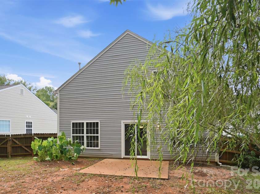 1619 Eagle Lake Drive, Indian Land, SC 29707.  MLS# CAR4431314, YatesRealty ID 55250. Rear exterior and patio