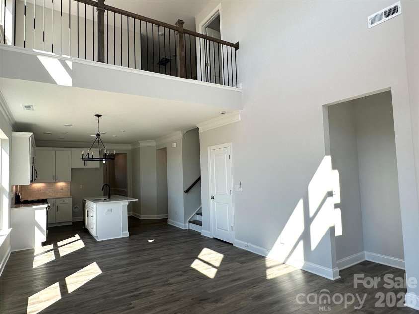 109 Pull Lane, Troutman, NC 28166.  MLS# CAR4432420, YatesRealty ID 55260. Two story Family Room