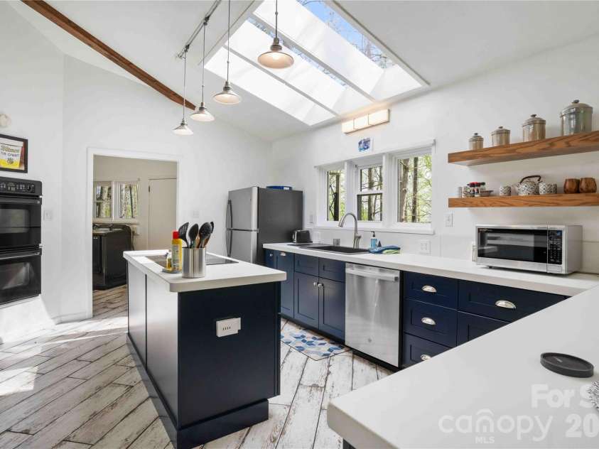 39 Tatham Road, Hendersonville, NC 28792.  MLS# CAR4430051, YatesRealty ID 55270. Kitchen sky lights