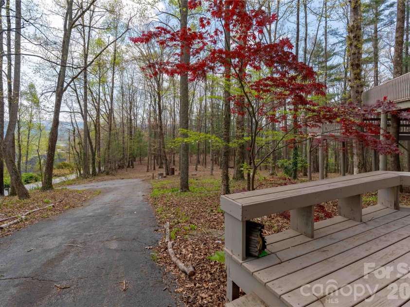 39 Tatham Road, Hendersonville, NC 28792.  MLS# CAR4430051, YatesRealty ID 55270. Southerly paved drive/entrance.