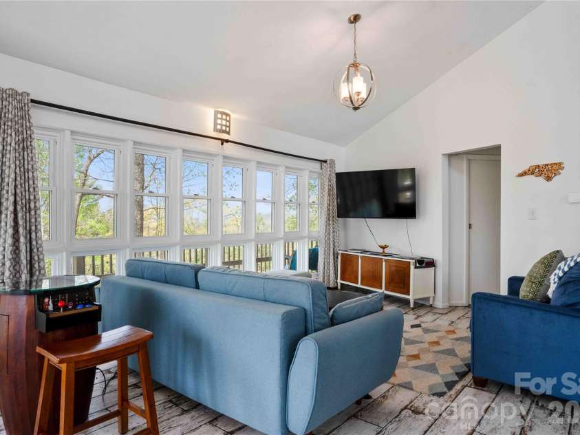 39 Tatham Road, Hendersonville, NC 28792.  MLS# CAR4430051, YatesRealty ID 55270. Upper sitting/entertainment.