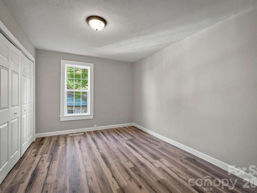 1203 Spainhour Street, Lenoir, NC 28645.  MLS# CAR4432423, YatesRealty ID 55271. Bedroom 2