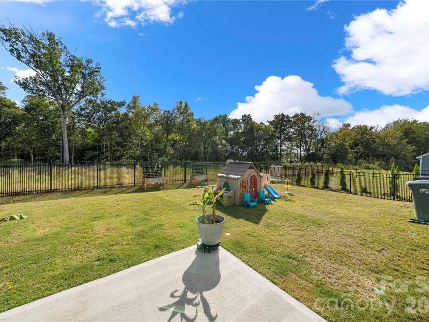 3838 Pee Dee Street, Monroe, NC 28110.  MLS# CAR4431961, YatesRealty ID 55273. Beautiful fenced in backyard that faces a dry pond/woods!