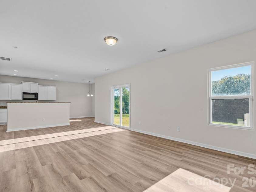 6215 Paw Village Road, Charlotte, NC 28214.  MLS# CAR4432466, YatesRealty ID 55279. Open living / kitchen / dining