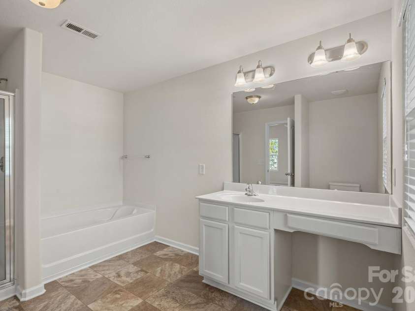 6215 Paw Village Road, Charlotte, NC 28214.  MLS# CAR4432466, YatesRealty ID 55279. Primary bath