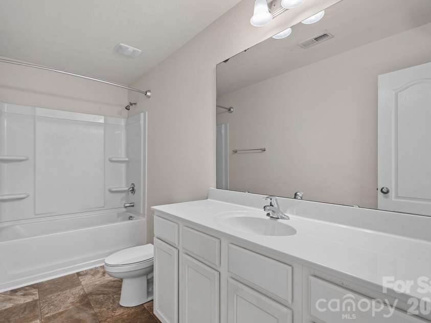 6215 Paw Village Road, Charlotte, NC 28214.  MLS# CAR4432466, YatesRealty ID 55279. Second upstairs full bath