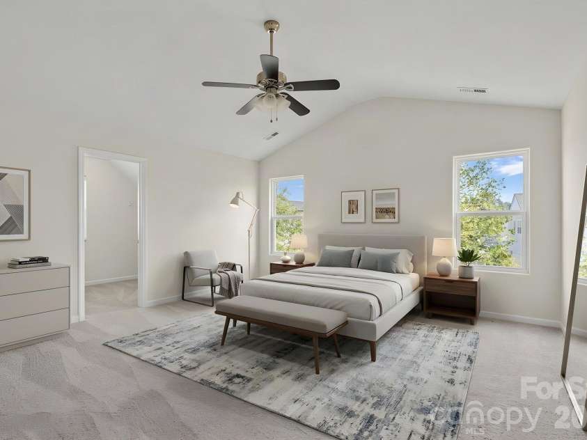 6215 Paw Village Road, Charlotte, NC 28214.  MLS# CAR4432466, YatesRealty ID 55279. Virtually staged - Primary bedroom with vaulted ceiling