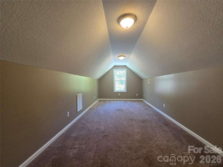 15 Tiki Way, Candler, NC 28715.  MLS# CAR4422310, YatesRealty ID 55288. Bonus room on second level