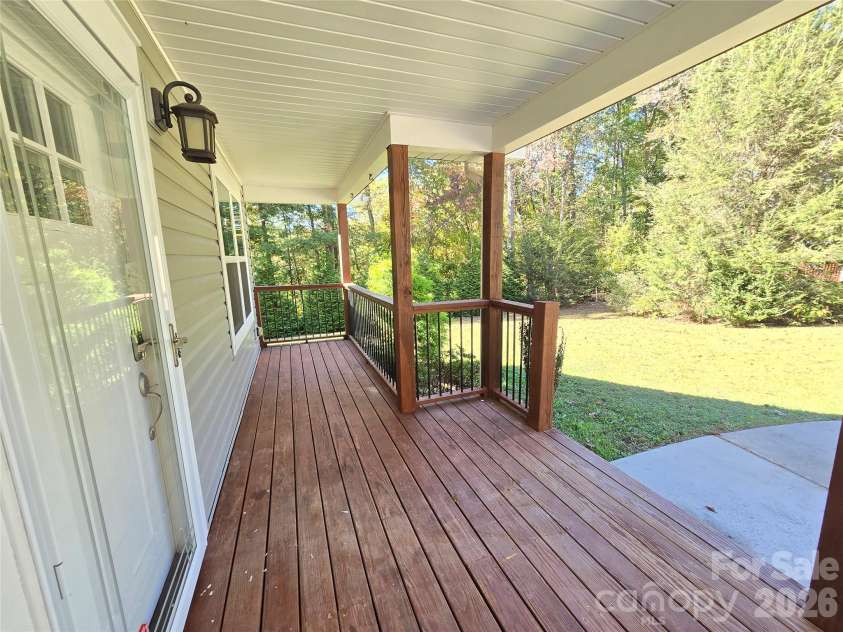 15 Tiki Way, Candler, NC 28715.  MLS# CAR4422310, YatesRealty ID 55288. Front porch