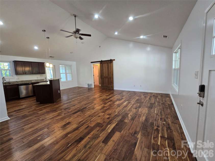 15 Tiki Way, Candler, NC 28715.  MLS# CAR4422310, YatesRealty ID 55288. Great room with vaulted ceilings