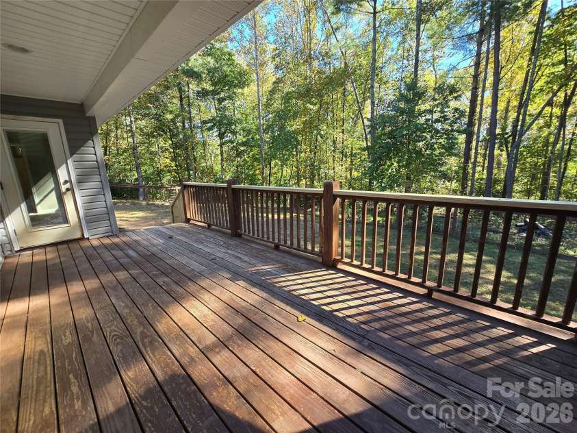 15 Tiki Way, Candler, NC 28715.  MLS# CAR4422310, YatesRealty ID 55288. Large back deck