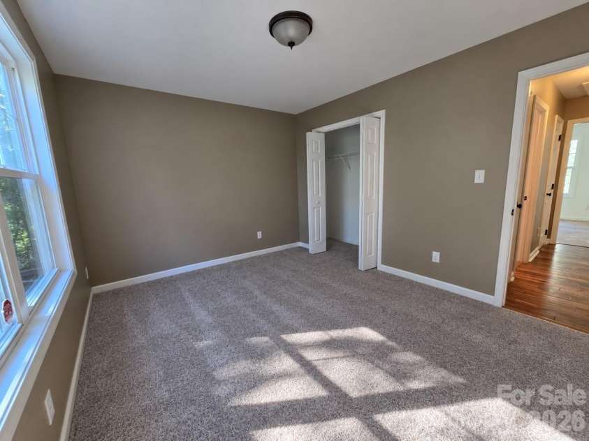 15 Tiki Way, Candler, NC 28715.  MLS# CAR4422310, YatesRealty ID 55288. Split bedroom plan - bed 2