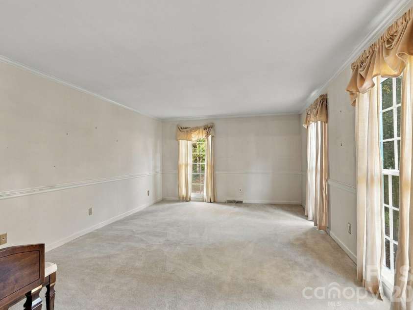 233 Nottingham Circle, Statesville, NC 28625.  MLS# CAR4403951, YatesRealty ID 55294. Front room or office