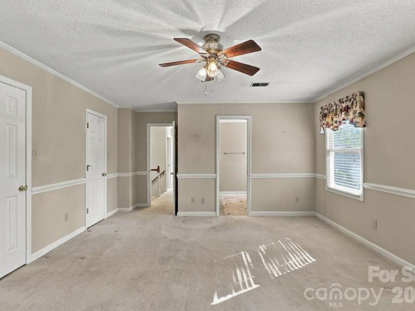 233 Nottingham Circle, Statesville, NC 28625.  MLS# CAR4403951, YatesRealty ID 55294. Primary bedroom