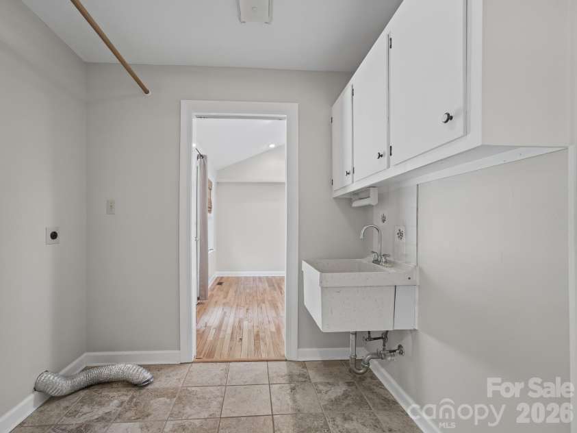 109 Yardley Court, Hendersonville, NC 28739.  MLS# CAR4432474, YatesRealty ID 55299. Laundry Room