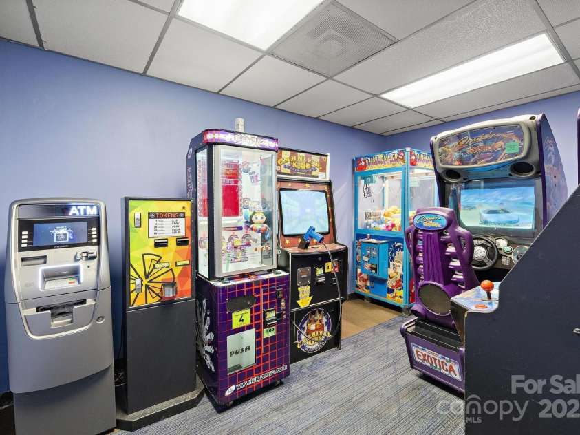 301 Pinnacle Inn Road, Beech Mountain, NC 28604.  MLS# CAR4210516, YatesRealty ID 553. Arcade at the All Seasons Center