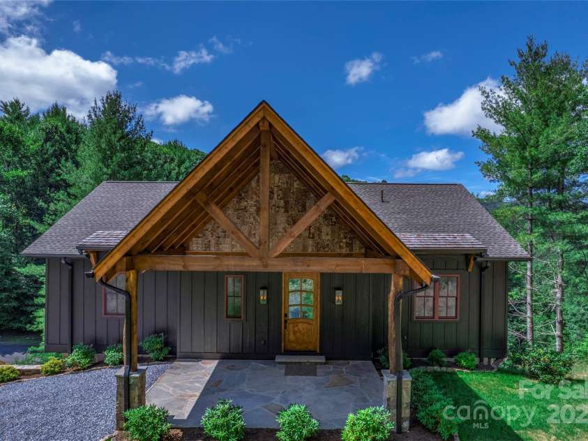 750 Silver Springs Drive, Banner Elk, NC 28604.  MLS# CAR4160928, YatesRealty ID 553. Covered porte-cochere entrance