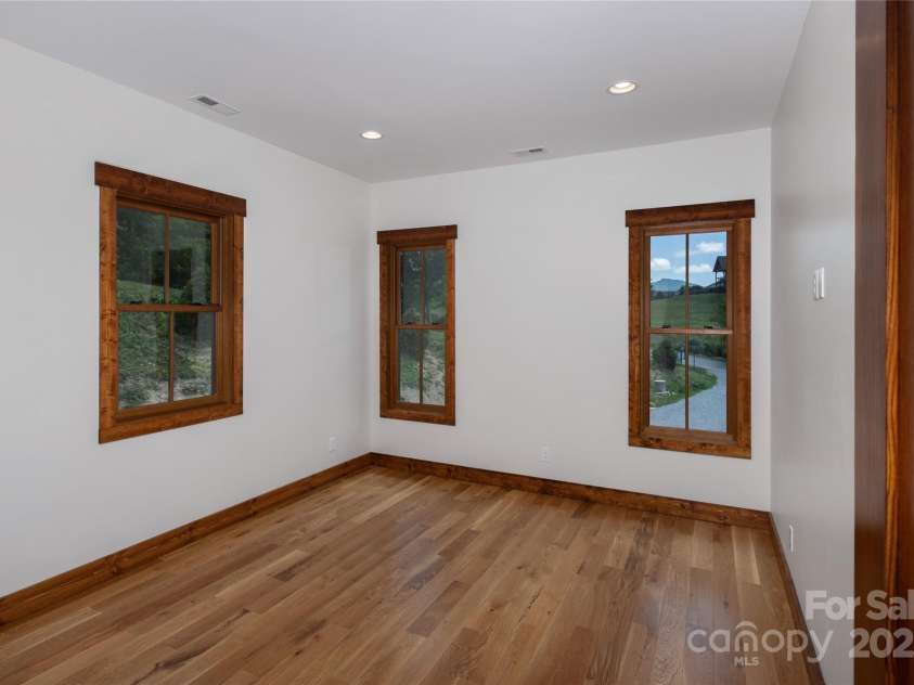 750 Silver Springs Drive, Banner Elk, NC 28604.  MLS# CAR4160928, YatesRealty ID 553. Main floor secondary bedroom and full bathroom