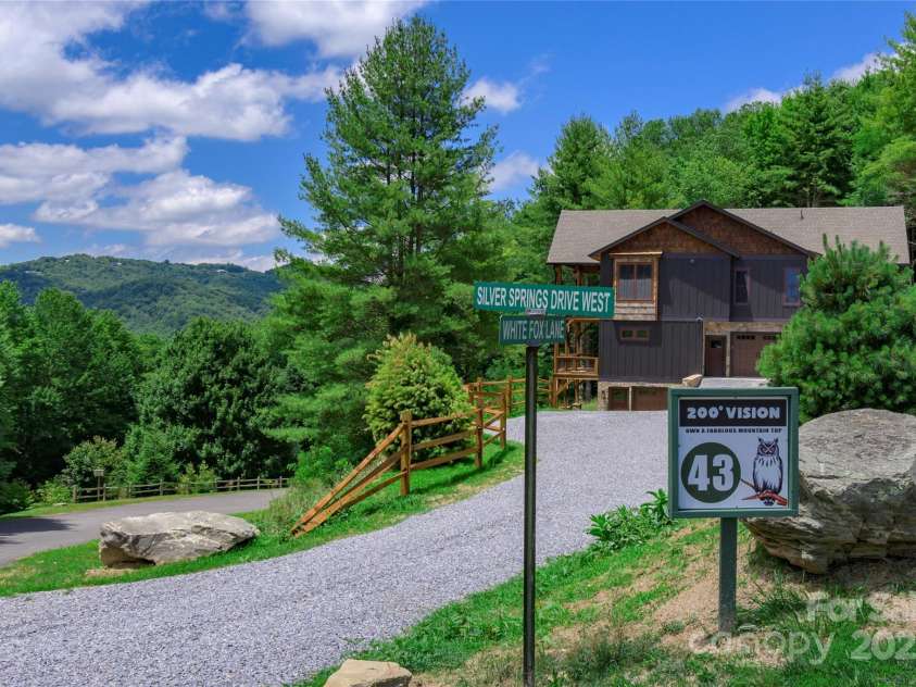750 Silver Springs Drive, Banner Elk, NC 28604.  MLS# CAR4160928, YatesRealty ID 553. Majestic, private mountain & neighborhood pond views