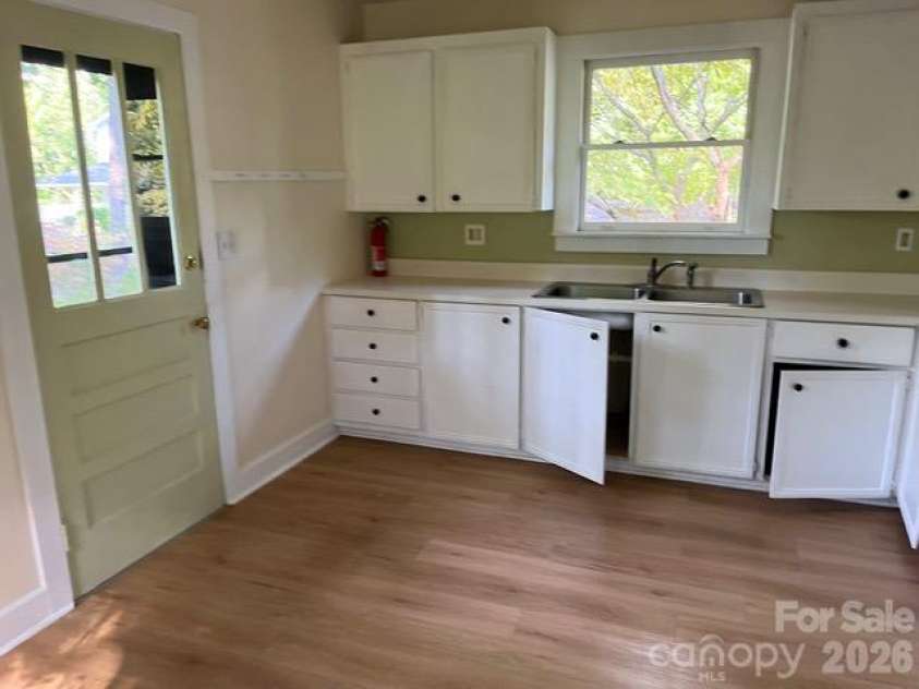 65 Bickford Avenue, Tryon, NC 28782.  MLS# CAR4432546, YatesRealty ID 55301. 