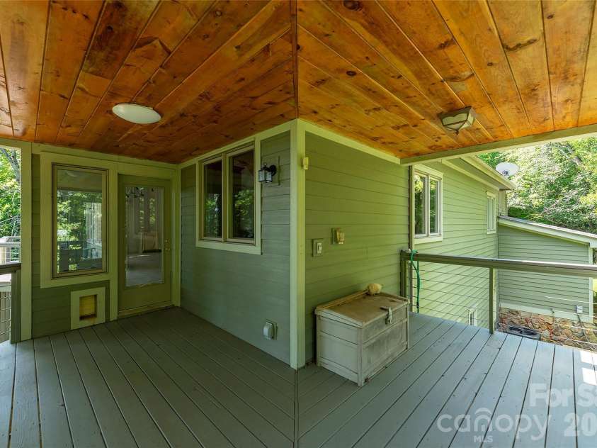 226 Strickland Drive, Waynesville, NC 28785.  MLS# CAR4407151, YatesRealty ID 55329. Back & Side Covered Deck.