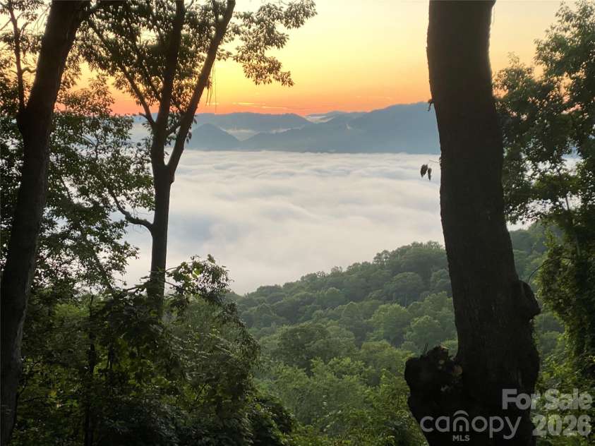 226 Strickland Drive, Waynesville, NC 28785.  MLS# CAR4407151, YatesRealty ID 55329. Stunning Views