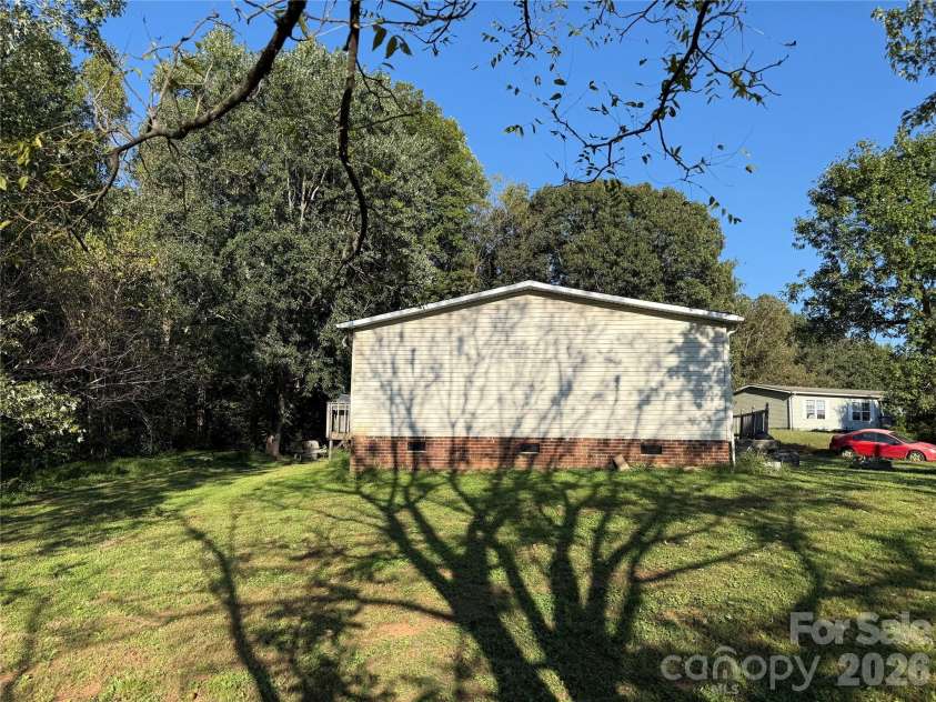 142 Forest Grove Drive, Statesville, NC 28625.  MLS# CAR4431257, YatesRealty ID 55332. 