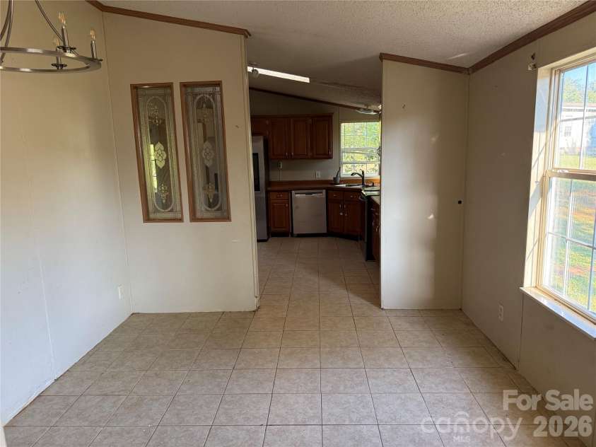 142 Forest Grove Drive, Statesville, NC 28625.  MLS# CAR4431257, YatesRealty ID 55332. 
