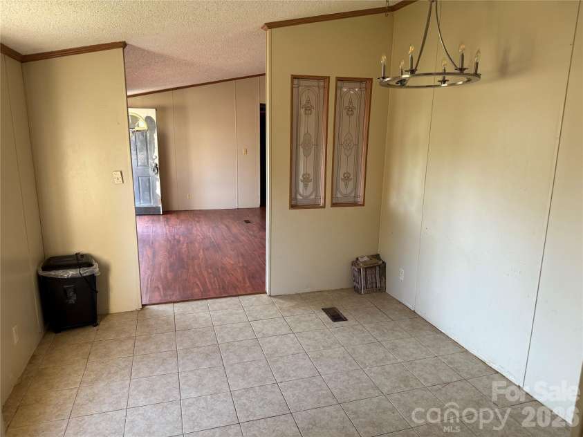 142 Forest Grove Drive, Statesville, NC 28625.  MLS# CAR4431257, YatesRealty ID 55332. 