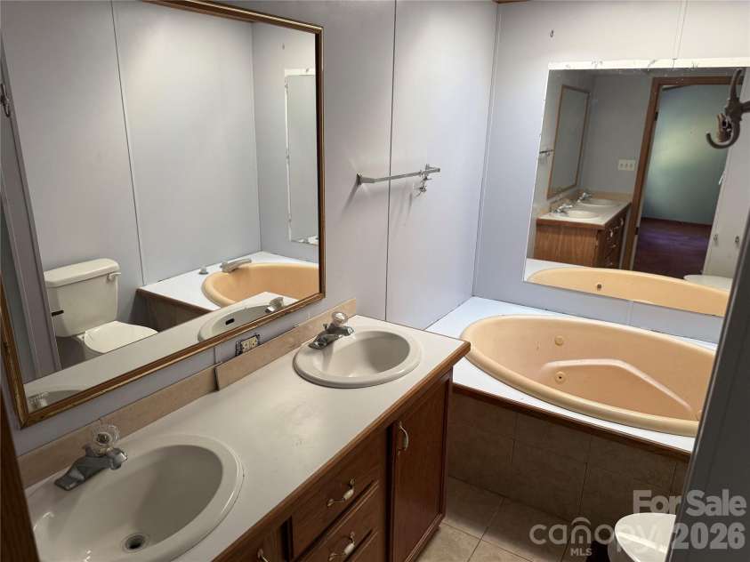 142 Forest Grove Drive, Statesville, NC 28625.  MLS# CAR4431257, YatesRealty ID 55332. 