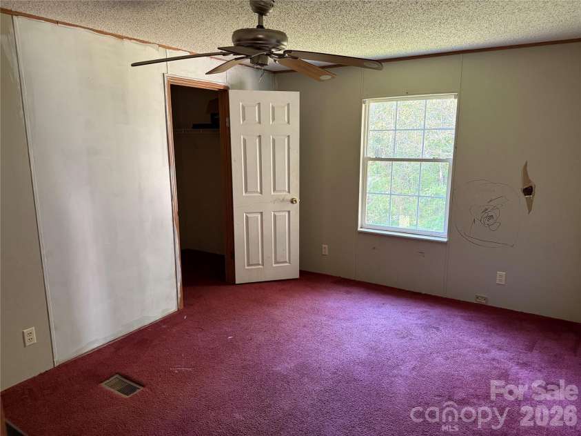 142 Forest Grove Drive, Statesville, NC 28625.  MLS# CAR4431257, YatesRealty ID 55332. 