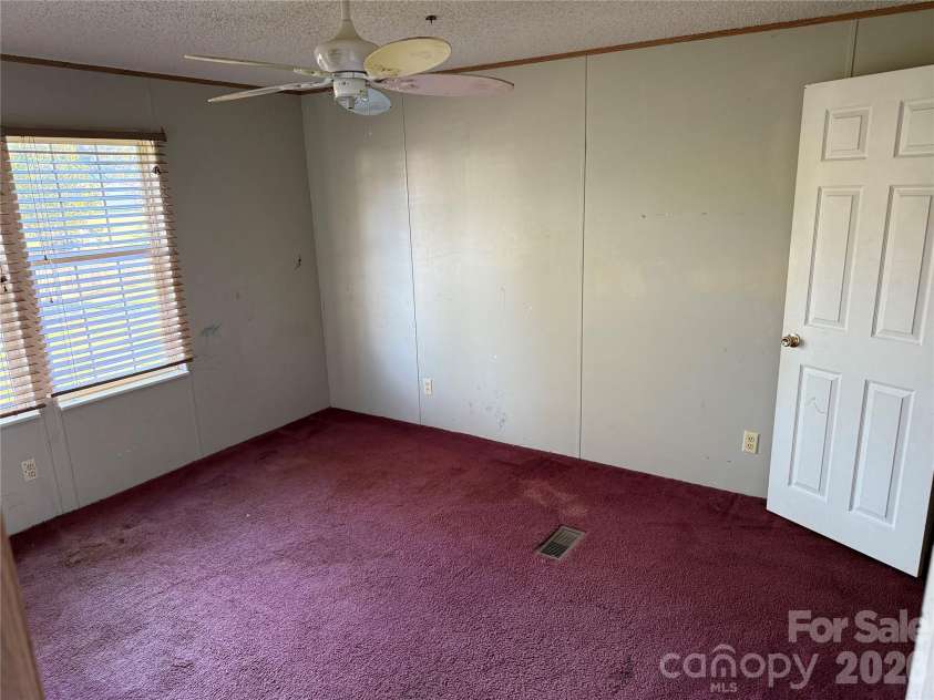 142 Forest Grove Drive, Statesville, NC 28625.  MLS# CAR4431257, YatesRealty ID 55332. 