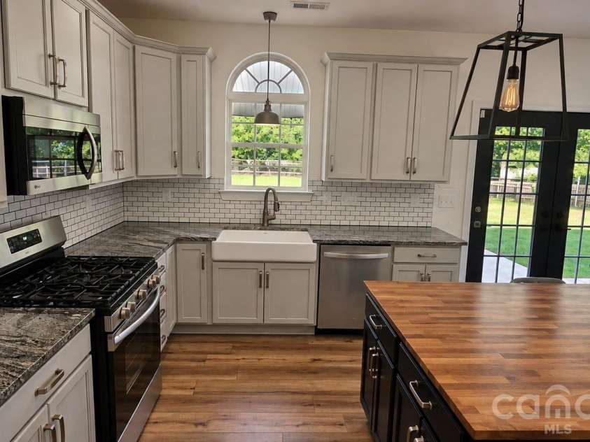 4954 Riverview Drive, Harrisburg, NC 28075.  MLS# CAR4432620, YatesRealty ID 55335. 