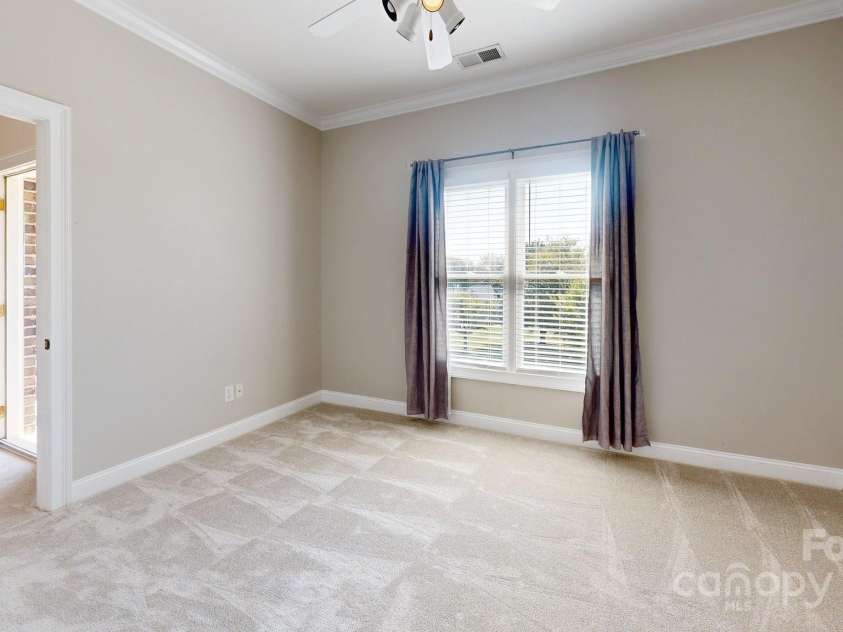 204 Knoxview Lane, Mooresville, NC 28117.  MLS# CAR4154084, YatesRealty ID 5534. Bedroom 2 with interior Juliet balcony and access to 2nd floor outdoor balcony.