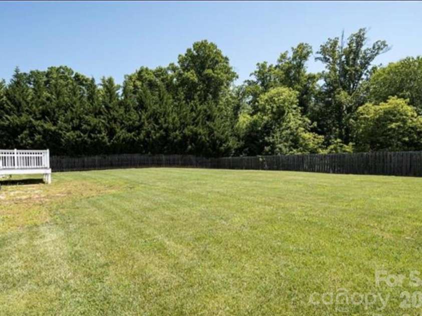224 Pete Luther Road, Candler, NC 28715.  MLS# CAR4432613, YatesRealty ID 55340. And the level yard is enormous