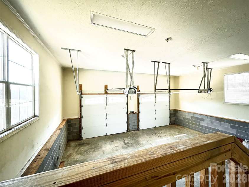 224 Pete Luther Road, Candler, NC 28715.  MLS# CAR4432613, YatesRealty ID 55340. Bright Double Garage w/Windows