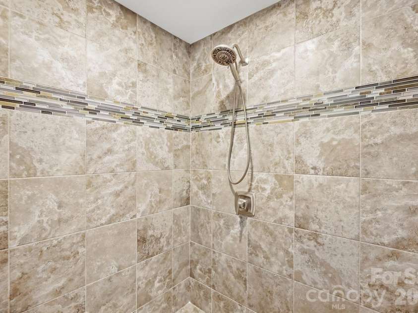 4315 Emory Lane, Charlotte, NC 28211.  MLS# CAR4432596, YatesRealty ID 55348. Oversized Shower