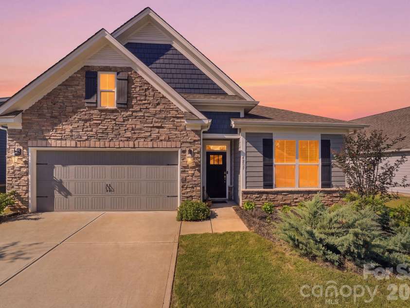 4207 Millstream Road, Denver, NC 28037.  MLS# CAR4431983, YatesRealty ID 55356. Front of Home Digitally Enhanced Twilight