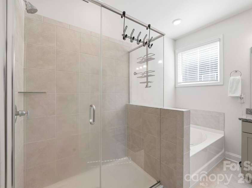 4207 Millstream Road, Denver, NC 28037.  MLS# CAR4431983, YatesRealty ID 55356. Shower with Garden Tub