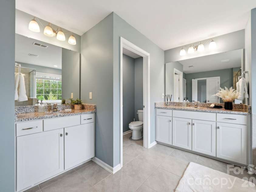 2029 Burton Point Court, Waxhaw, NC 28173.  MLS# CAR4431595, YatesRealty ID 55358. Primary bathroom
