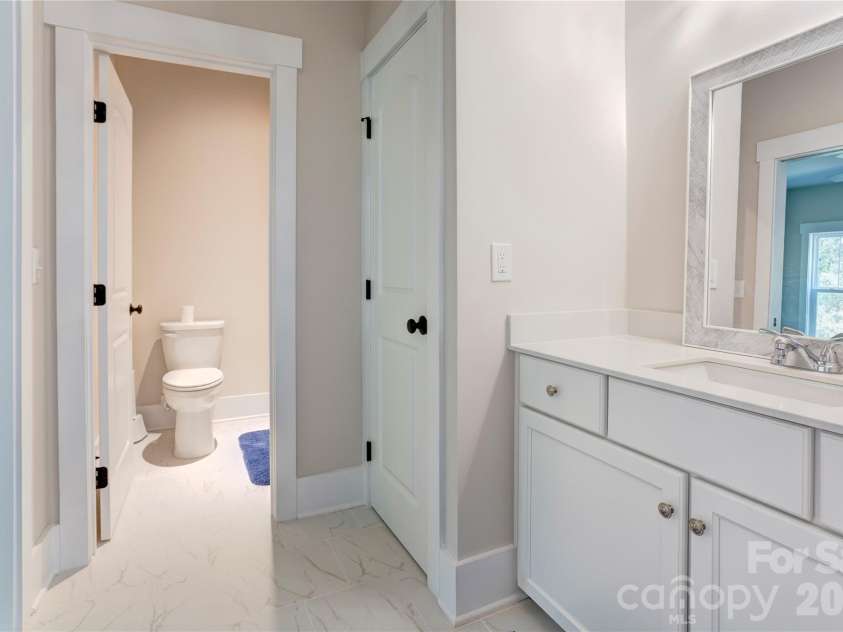 158 Fulworth Drive, Concord, NC 28027.  MLS# CAR4431518, YatesRealty ID 55361. A full bath upstairs keeps the second level self-contained for guests.