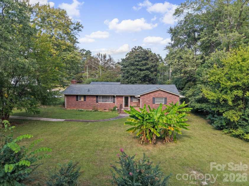 701 Denning Place, Charlotte, NC 28227.  MLS# CAR4431455, YatesRealty ID 55364. Full Brick Ranch home